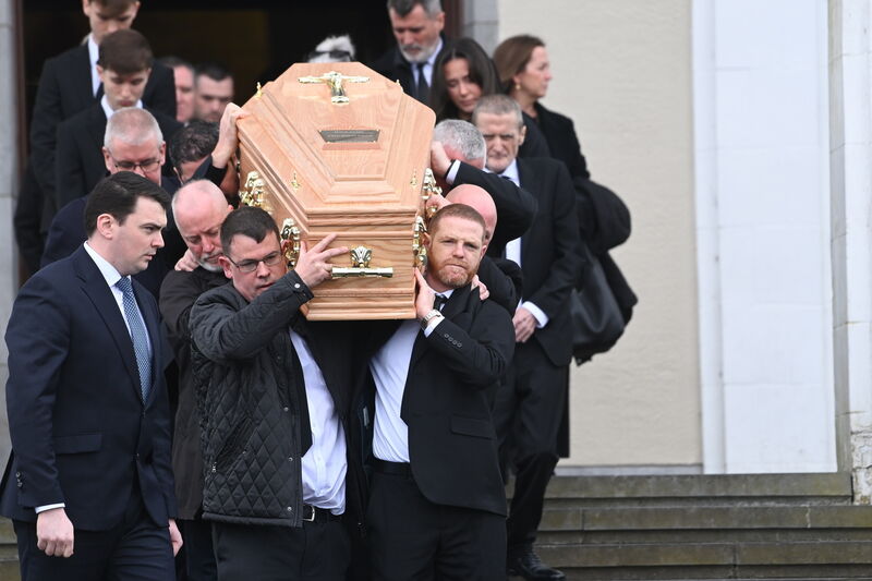  The coffin is shouldered from the church after requiem mass at the funeral of Marie Keane at the Church of the Resurrection, Farranree, Cork. Picture: Larry Cummins