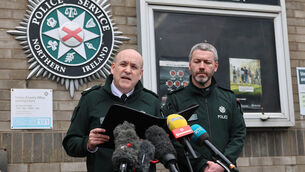 <p>Assistant Chief Constable Ryan Henderson (left) and District Commander Superintendent Brendan Green speak to the media outside the police station in Lurgan (Liam McBurney/PA)</p>