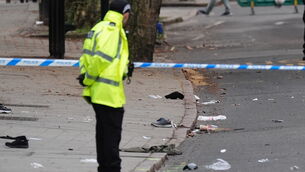 <p>Shoes and blankets at the scene in Friar Gate, Derby (PA)</p>