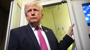 <p>President Donald Trump speaks to reporters aboard Air Force One en route from West Palm Beach, Fla., to Joint Base Andrews, Md., Sunday, March 29, 2026. (AP Photo/Mark Schiefelbein)</p>