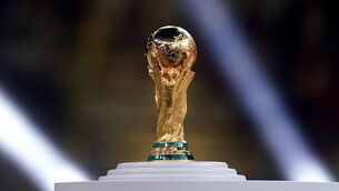 <p>GOLDEN DREAMS: The FIFA World Cup trophy. Pic: Mike Egerton/PA Wire.</p>