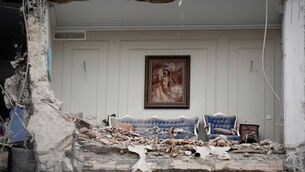 <p>Rubble covers the furniture of a destroyed living room in a residential building in Tehran (Vahid Salemi/AP)</p> <p>Rubble covers the furniture of a destroyed living room in a residential building in Tehran (Vahid Salemi/AP)</p>