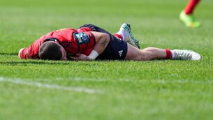 <p>OUT: Calvin Nash on the field after a tackle on Willie le Roux of Vodacom Bulls. Pic: Nic Bothma/Sportsfile.</p>