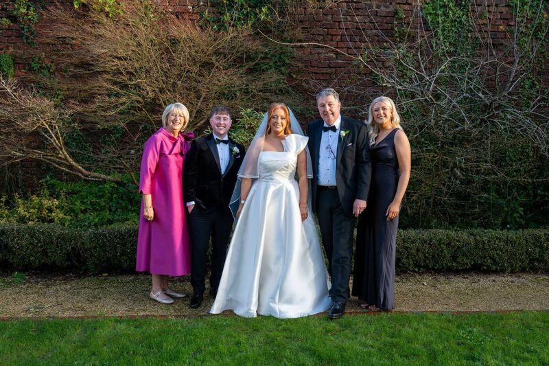 Anna Bell and Bryan Kehoe with the bride's family.