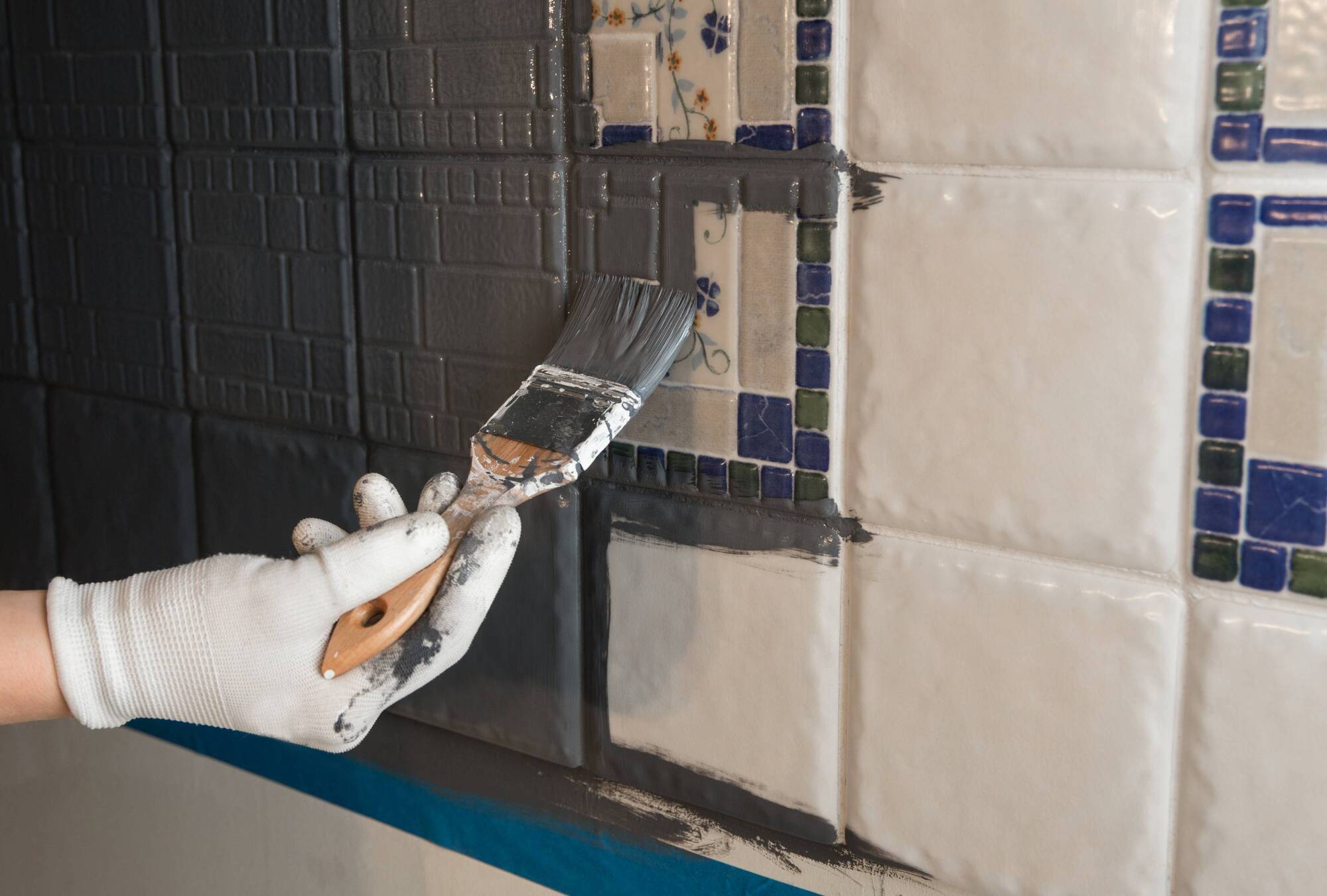 My kitchen tiles are an awful colour. How can I paint over them?