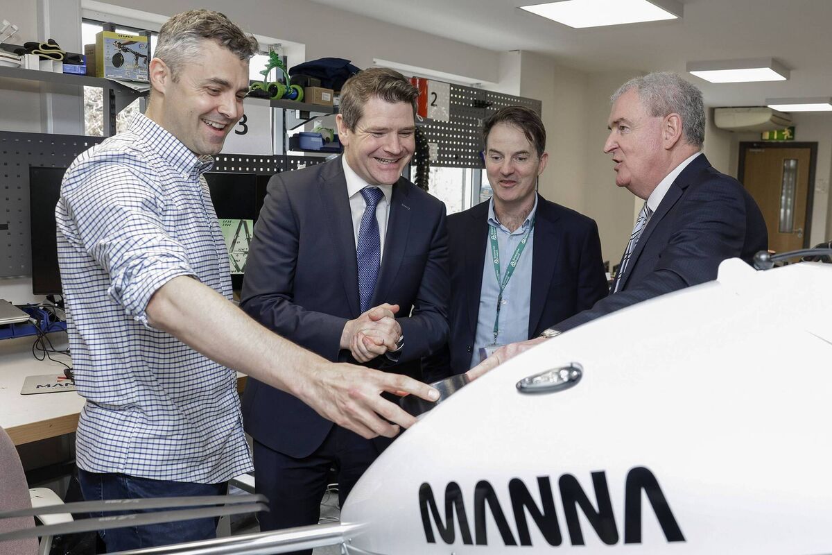 From left: Paul Connolly, head of hardware engineering, Manna Air Delivery; enterprise minister Peter Burke; Donnchadh Cullinan, head of enterprise solutions, Enterprise Ireland, at Manna Air Delivery in Dublin on Wednesday.