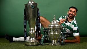 <p>WE GO AGAIN: Roberto Lopes of Shamrock Rovers poses for a photograph with the SSE Airtricity Men's Premier Division trophy and FAI Cup. Photo by Stephen McCarthy/Sportsfile</p>
