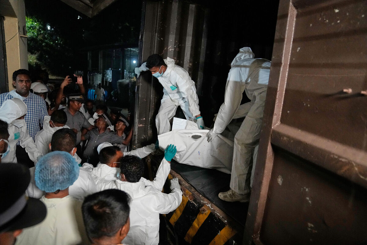 Healthcare workers unload the bodies of Iranian sailors from a vehicle who died when their IRIS Dena warship sank outside Sri Lanka's territorial waters, in Galle, Sri Lanka, Wednesday, March 4, 2026. (AP Photo/Eranga Jayawardena) Healthcare workers unload the bodies of Iranian sailors from a vehicle who died when their IRIS Dena warship sank outside Sri Lanka's territorial waters, in Galle, Sri Lanka, Wednesday, March 4, 2026. (AP Photo/Eranga Jayawardena)