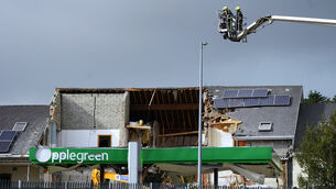 <p>Emergency services working at the scene of an explosion at Applegreen service station in the village of Creeslough in Co Donegal. Picture: Brian Lawless.</p>