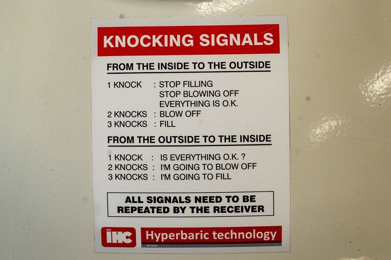 Signalling instructions displayed beside a hyperbaric chamber at the Naval Service Diving Section facilities in Haulbowline Naval Base in Cork. Picture: Chani Anderson