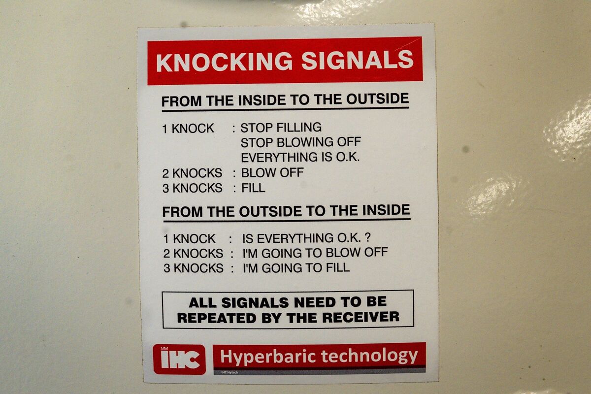 Signalling instructions displayed beside a hyperbaric chamber at the Naval Service Diving Section facilities in Haulbowline Naval Base in Cork. Picture: Chani Anderson Signalling instructions displayed beside a hyperbaric chamber at the Naval Service Diving Section facilities in Haulbowline Naval Base in Cork. Picture: Chani Anderson