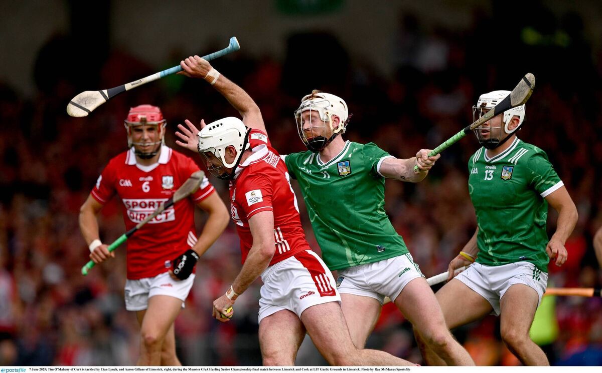 Tim O'Mahony is tackled by Cian Lynch, and Aaron Gillane. Pic: Ray McManus/Sportsfile.