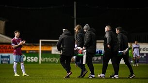 <p>Shane Farrell of Drogheda United is taken from the pitch on a stretcher. Pic: Ben McShane/Sportsfile</p>