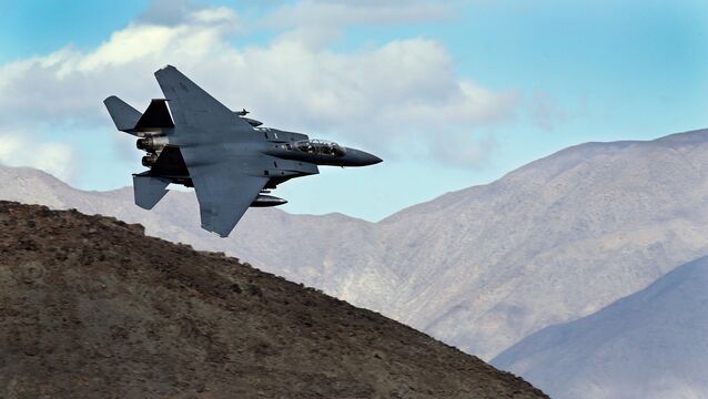 An F-15E Strike Eagle turns toward the Panamint range over Death Valley National Park, California (Ben Margot/AP)