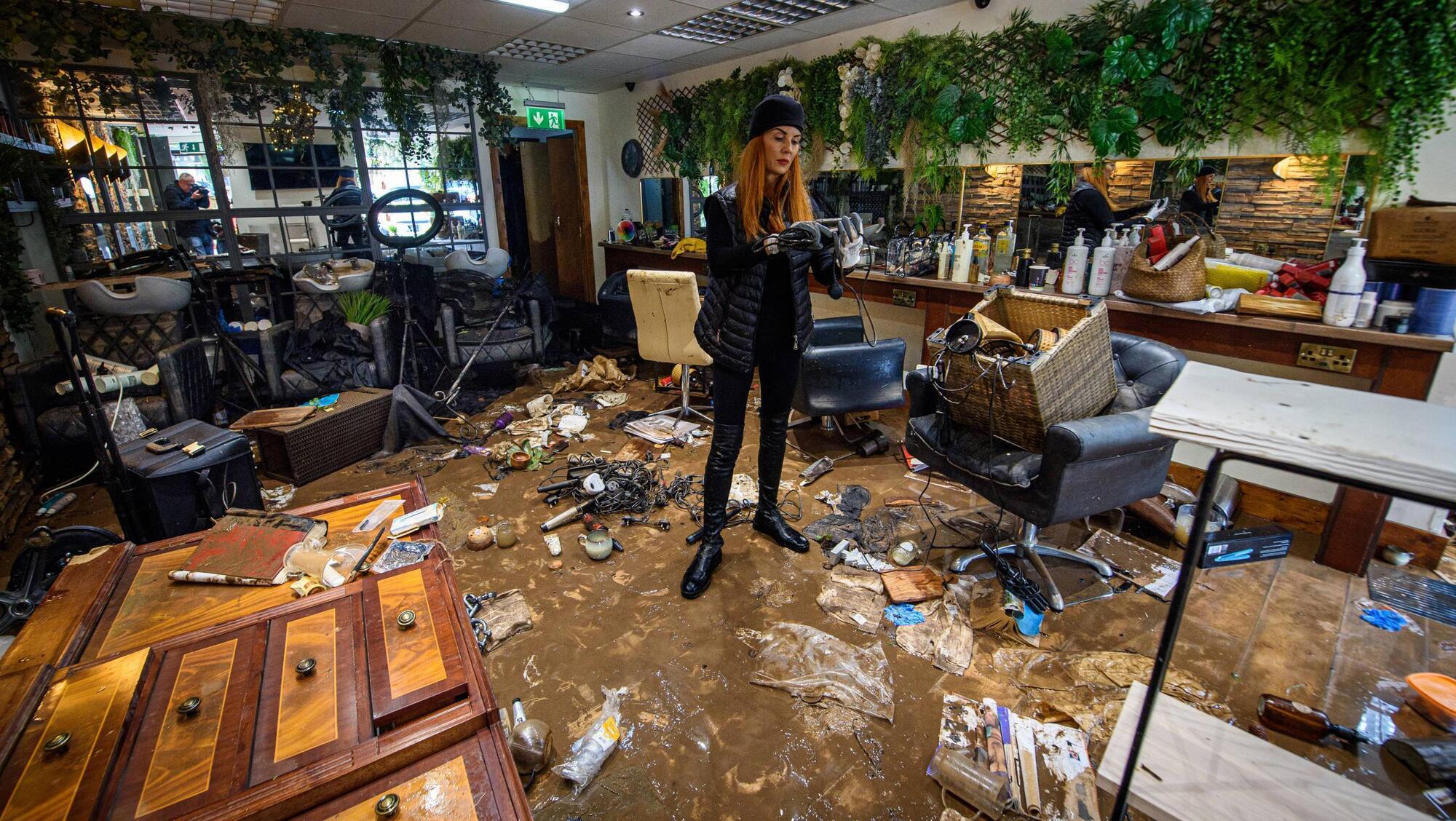 Rosaleen O’Donnell, proprietor of the HS2 Salon in Midleton, standing in her hair salon which was destroyed by flood water brought by Storm Babet in October 2023. Picture: Dan Linehan