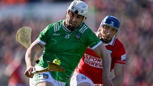 <p>LIMERICK'S LEADER: Aaron Gillane in action against Seán O'Donoghue during the Allianz Hurling League Division 1A final. Pic: Ben McShane/Sportsfile</p>