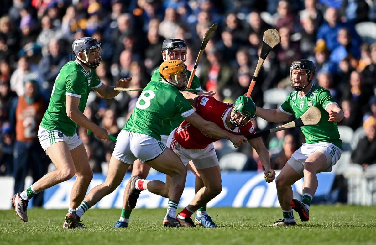 Séamus Harnedy of Cork in action against Limerick players David Reidy, Adam English, Aidan O'Connor and Peter Casey. Picture: Ben McShane/Sportsfile