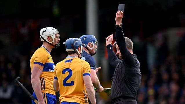 <p>Referee Thomas Walsh shows the black card to Rory Hayes of Clare, 2 during the Allianz Hurling League Division 1B final match between Clare and Dublin at TUS Gaelic Grounds in Limerick. Photo by Piaras Ó Mídheach/Sportsfile</p>