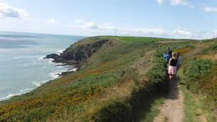 <p>Pass the Cliff House Hotel before embarking on a scenic path that meanders around a peninsula, with slopes dropping seaward.</p> <p>Pass the Cliff House Hotel before embarking on a scenic path that meanders around a peninsula, with slopes dropping seaward.</p>