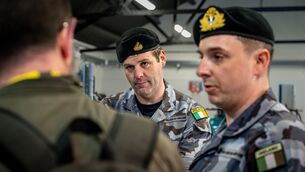 <p>Lt Cdr Aonghus Ó Neachtain and Lt Jason Croke speak with Irish Examiner security correspondent Cormac O’Keeffe at Haulbowline Naval Base in Cork Harbour. Picture: Chani Anderson</p>