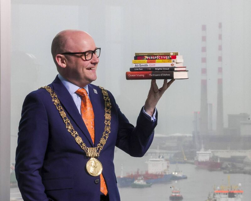 The Lord Mayor of Dublin, Councillor Ray McAdam with the six novels shortlisted for the 2026 Dublin Literary Award. Picture: Chris Bellew / Fennell Photography 