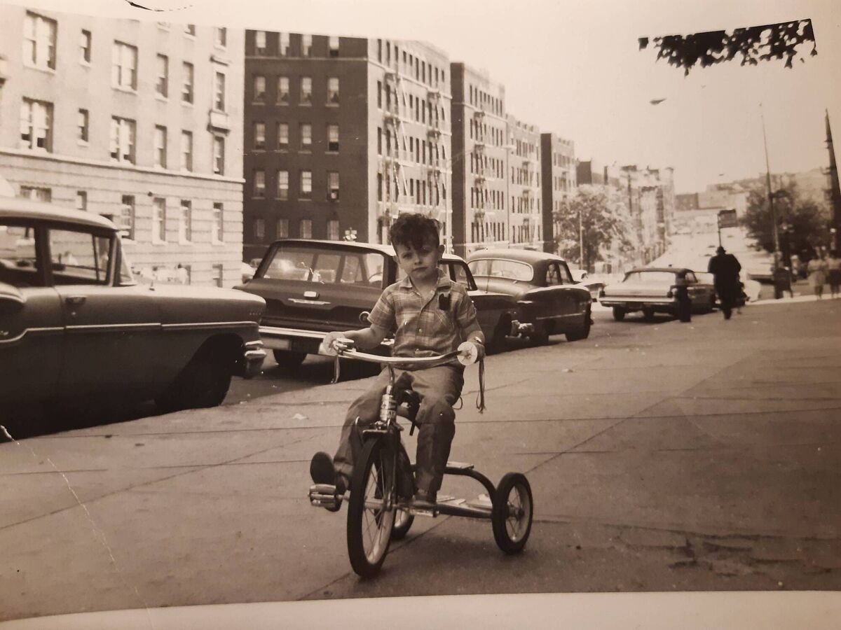 Marty cycling on University Avenue in the Bronx, New York.