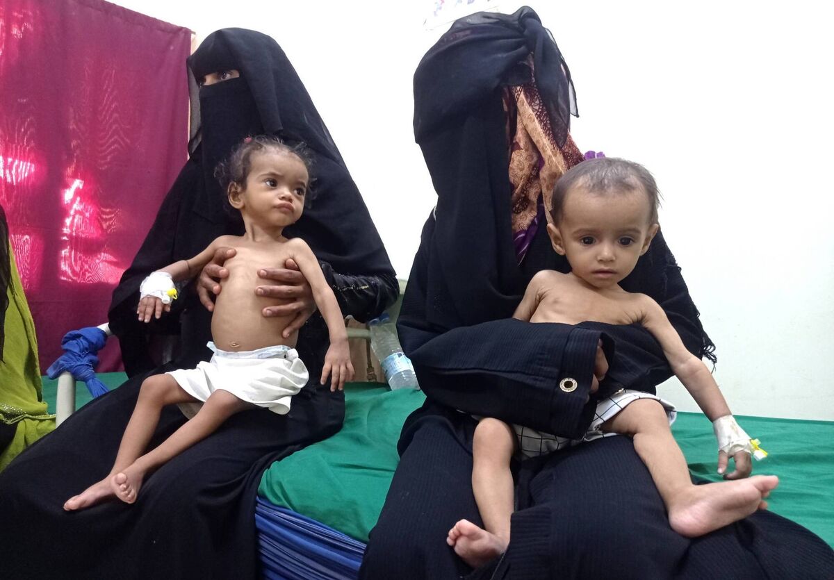 Women hold their malnourished children at Hays Rural Hospital in Yemen. In many Middle Eastern and African nations, climatic shocks killed hundreds and displaced thousands every year, causing worsening food shortages. Photo: AP/Hussam Al-Bakry Women hold their malnourished children at Hays Rural Hospital in Yemen. In many Middle Eastern and African nations, climatic shocks killed hundreds and displaced thousands every year, causing worsening food shortages. Photo: AP/Hussam Al-Bakry