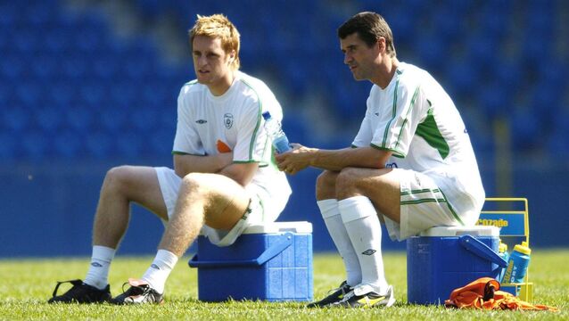 <p>STIRLING EFFORT: Roy Keane with Ireland team-mate Alan Maybury during squad training. Pic: David Maher / SPORTSFILE.</p>