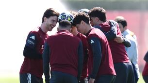<p>HEAD IN THE GAME: Arsenal's Declan Rice (left) and team-mates balance a ball between their heads. Pic: John Walton/PA Wire.</p>