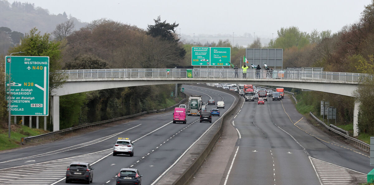 First view of the rolling protest heading east to the Jack Lynch tunnell. Picture: Jim Coughlan. First view of the rolling protest heading east to the Jack Lynch tunnell. Picture: Jim Coughlan.