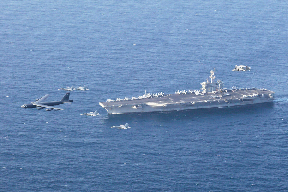 The USS Abraham Lincoln carrier and a US Air Force B-52H Stratofortress, conduct joint exercises in the US Central Command area of responsibility in Arabian Sea (Mass Communication Specialist 1st Class Brian M. Wilbur/U.S. Navy via AP, File) The USS Abraham Lincoln carrier and a US Air Force B-52H Stratofortress, conduct joint exercises in the US Central Command area of responsibility in Arabian Sea (Mass Communication Specialist 1st Class Brian M. Wilbur/U.S. Navy via AP, File)