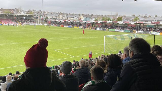 <p>COMEBACK KID: Tadhg watches his first League of Ireland match from the Shed as Cork City come from behind to beat Kerry. Pic: Andrew Horgan.</p>