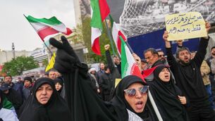 Iranian government supporters waving Iran flags on the streets of Tehran (AP Photo/Francisco Seco) Iranian government supporters waving Iran flags on the streets of Tehran (AP Photo/Francisco Seco)