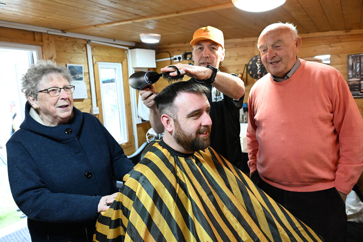 Donncha O'Connell of Buzz Cutz cutting the hair of his godson, Paul O'Sullivan, with his mother Kitty O'Connell (left) and Mick Moriarty (right at the opening party. Picture: Larry Cummins Donncha O'Connell of Buzz Cutz cutting the hair of his godson, Paul O'Sullivan, with his mother Kitty O'Connell (left) and Mick Moriarty (right at the opening party. Picture: Larry Cummins