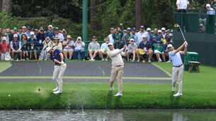 <p>Cameron Young, Scottie Scheffler and Sam Burns play a skip shot off the front of the tee on the par 3. Pic: David Cannon/Getty Images.</p> <p>Cameron Young, Scottie Scheffler and Sam Burns play a skip shot off the front of the tee on the par 3. Pic: David Cannon/Getty Images.</p>