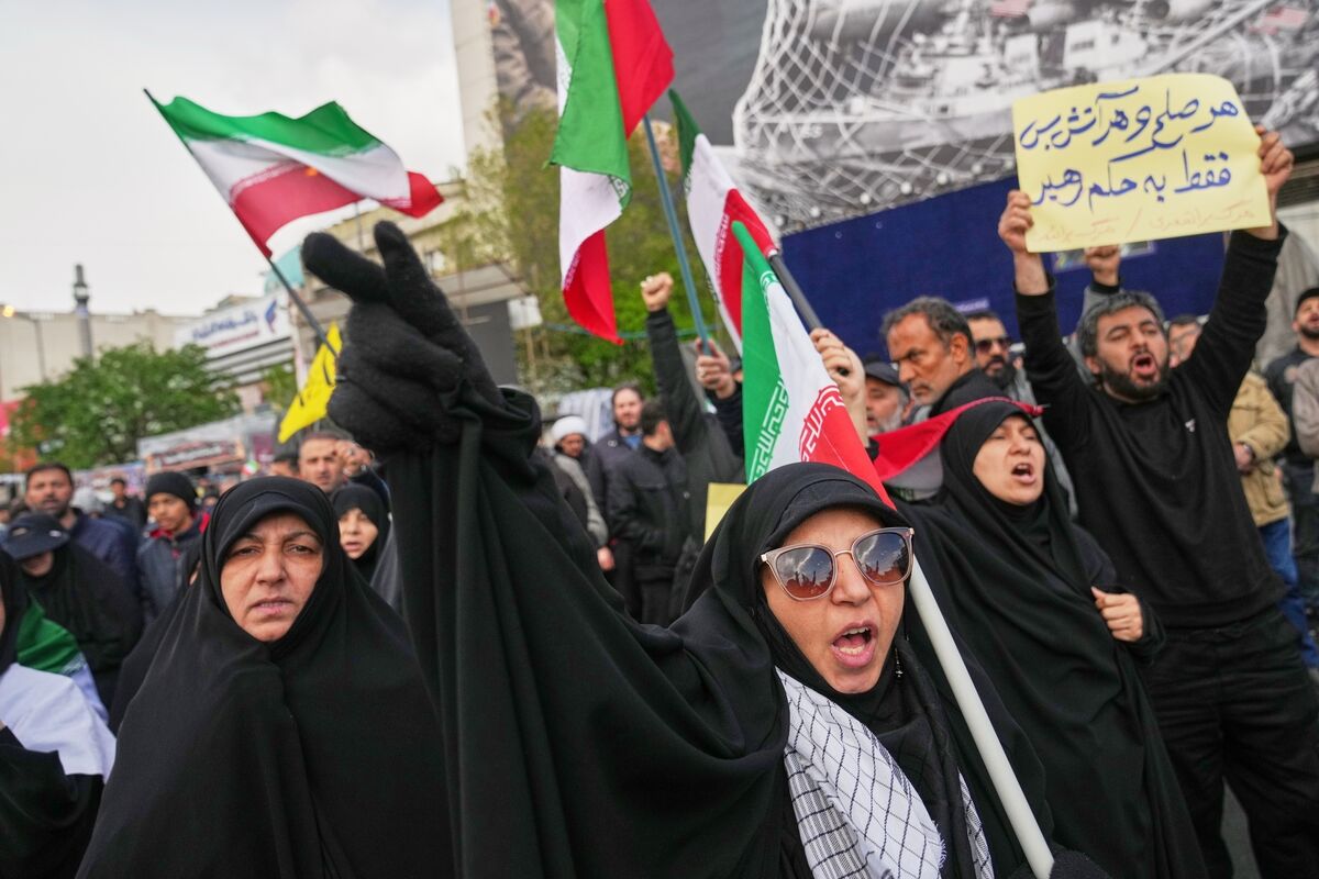Government supporters chant slogans after the announcement of a two-week ceasefire with the United States and Israel in Tehran, Iran, Wednesday, April 8, 2026. Picture: AP Photo/Francisco Seco