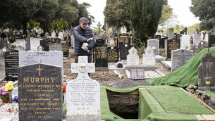 <p>Father Patrick Daly during the burial of Piotr Torng in Glasnevin Cemetary, Dublin. Picture: Gareth Chaney</p>
