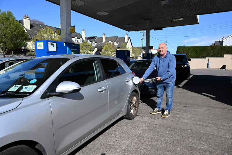 Anthony Hosford queued for approx 30 minutes to fill up with unleaded petrol. Picture: Larry Cummins Anthony Hosford queued for approx 30 minutes to fill up with unleaded petrol. Picture: Larry Cummins