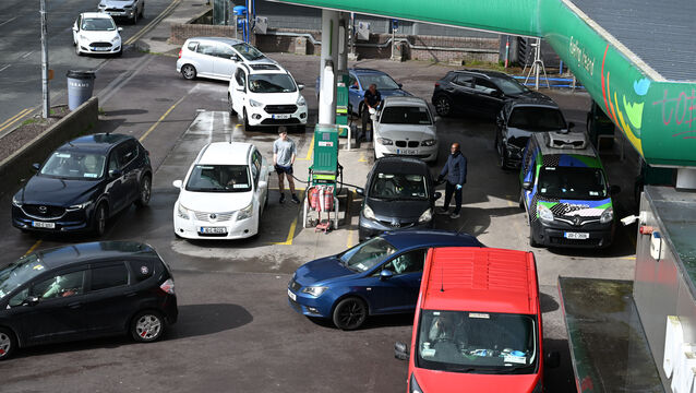 <p> A busy forecourt as motorists fill up at a service station on the South City Link Road, Cork. Picture: Larry Cummins</p>