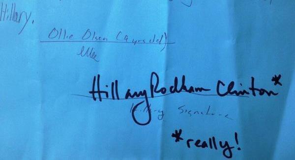 PIC: Hillary Clinton signs note to get boy out of school