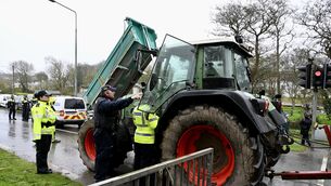 <p> Gardai speak with a tractor driver at the blockade on Friday at Whitegate, Cork. Picture: Larry Cummins</p> <p> Gardai speak with a tractor driver at the blockade on Friday at Whitegate, Cork. Picture: Larry Cummins</p>