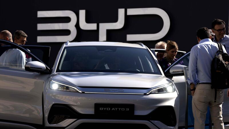 Visitors check the China made BYD ATTO 3 at the IAA motor show in Munich, Germany Picture: Matthias Schrader