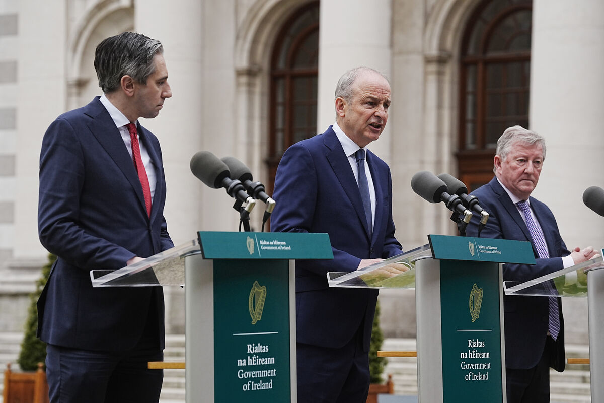 (Left to right) Tánaiste Simon Harris, Taoiseach Micheal Martin and Minister of State Sean Canney in the courtyard at Government Buildings. Micheál Martin was clear; we would not be talking to the protestors.