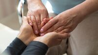 Hands of a mature woman or caregiver of care and support. Close-up.