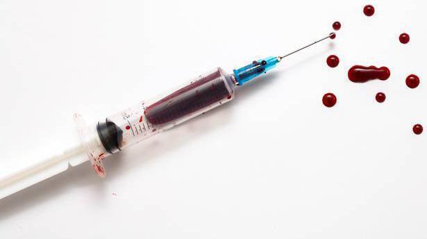 Drug addict cleaning blood from a syringe on Cork City street intimidated woman, court told