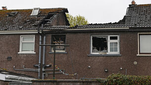 <p>The back of the house (centre) which also effected the adjoining homes in which Eilieen O'Leary lost her life in a fire at Palmbury Orchard, Togher Cork Picture; Eddie O'Hare</p>