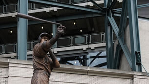 The bat on the statue of former Seattle Mariners right fielder Ichiro Suzuki is broken during the unveiling ceremony outside T-Mobile Park in Seattle (Lindsey Wasson/AP)