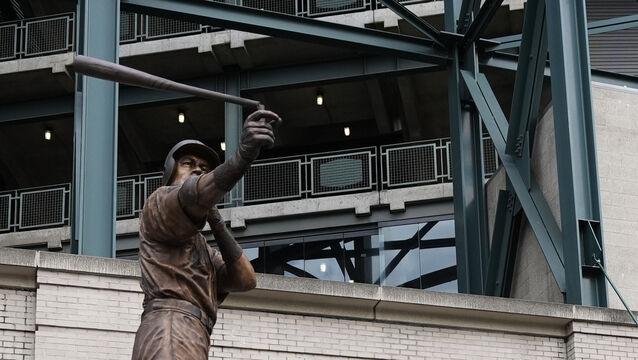 The bat on the statue of former Seattle Mariners right fielder Ichiro Suzuki is broken during the unveiling ceremony outside T-Mobile Park in Seattle (Lindsey Wasson/AP)