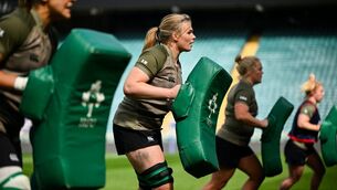 <p>SHOULDER TO SHOULDER: Dorothy Wall, centre, with Erin King, Cliodhna Moloney MacDonald and Neve Jones during an Ireland Women's Rugby captain's run. Pic: Shauna Clinton/Sportsfile.</p>