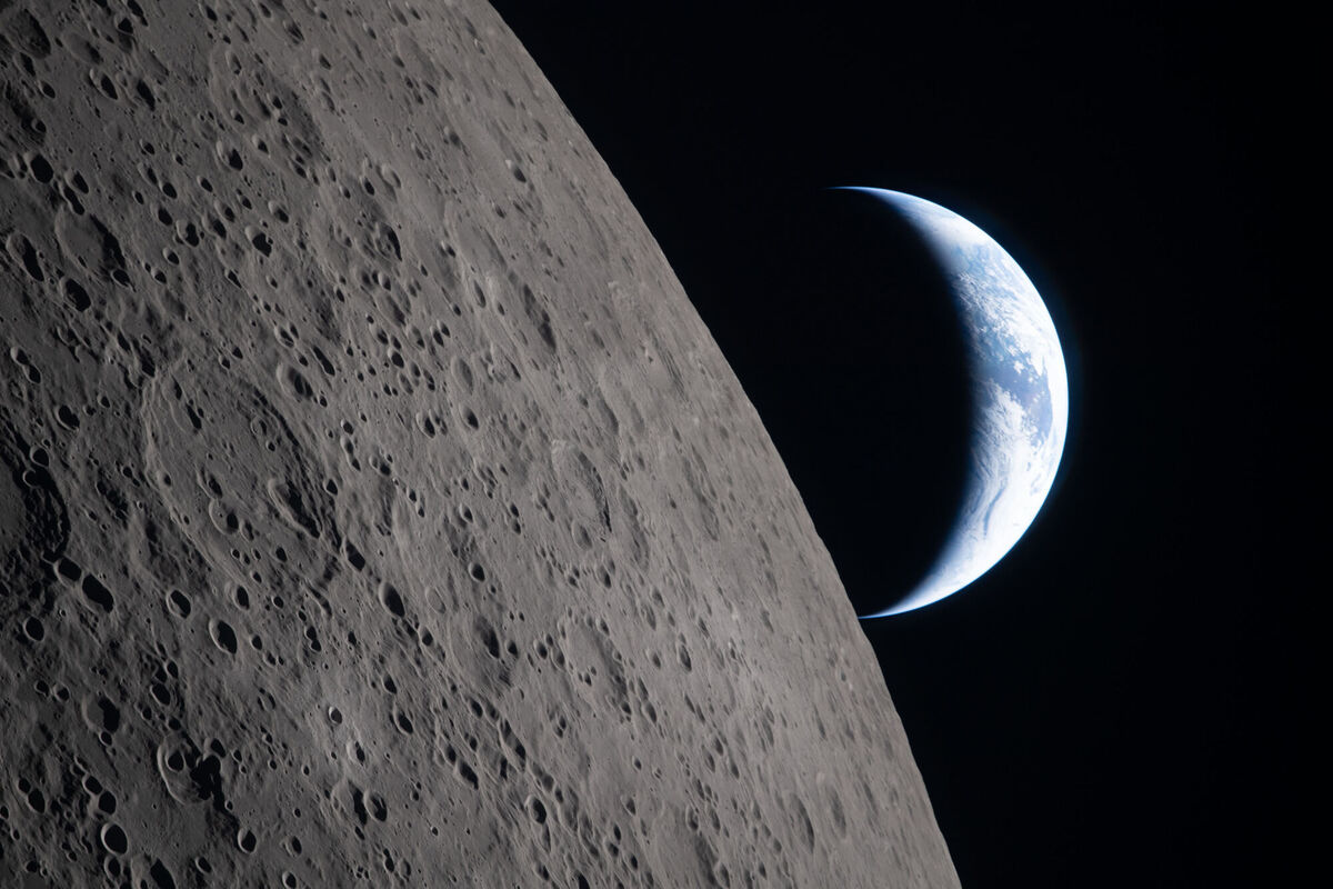In this image provided by NASA, the Artemis II crew captured this view as the Earth sets behind the Moon during a lunar flyby, Monday, April 6, 2026. (NASA via AP) In this image provided by NASA, the Artemis II crew captured this view as the Earth sets behind the Moon during a lunar flyby, Monday, April 6, 2026. (NASA via AP)